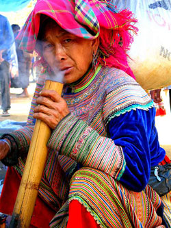 woman smoking bamboo bong
